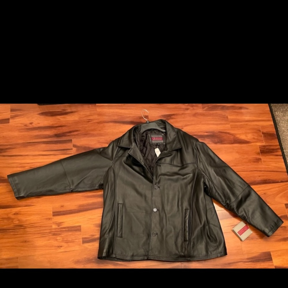 Mens leather jacket - new with tags! Never been worn.
